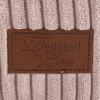 Le coussin pour chien rose en velours côtelé a un patch en cuir Designed by Lotte