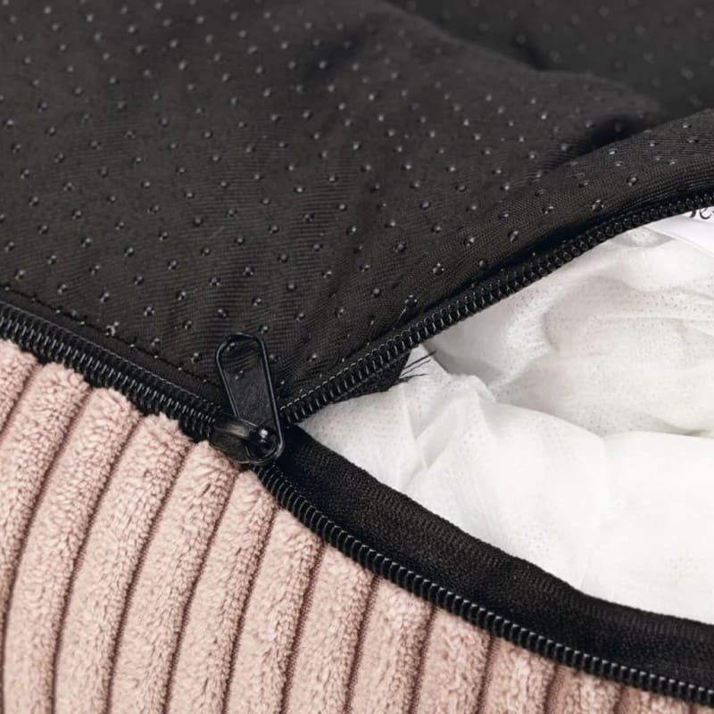 Le coussin pour chien rose en velours côtelé Designed by Lotte est déhoussable