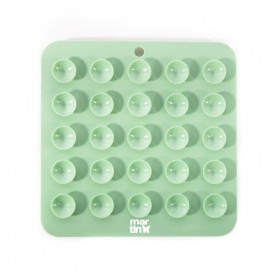 tapis de léchage pour chat vert silicone trio martin sellier de dos avec des ventouses
