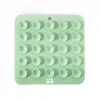 tapis de léchage pour chat vert silicone trio martin sellier de dos avec des ventouses