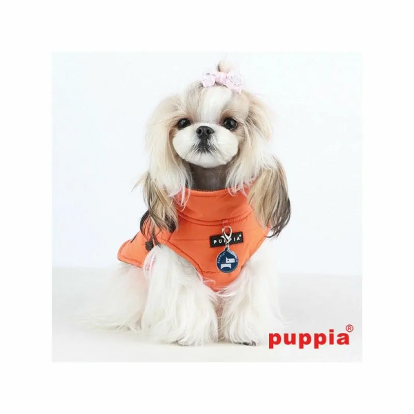 chien avec le manteau pour chien orange avec harnais intégré Mountaineer Puppia